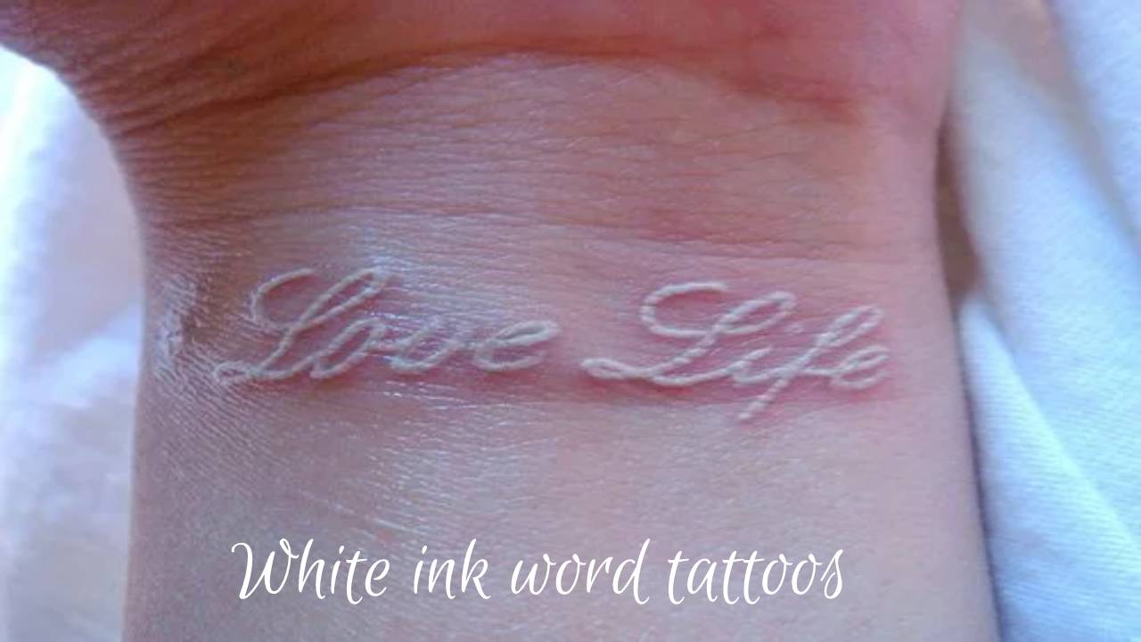 White ink word tattoos